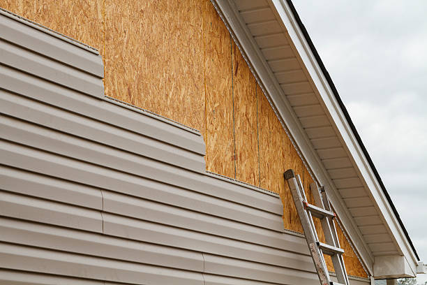 Professional Siding technician working in New Albany, OH
